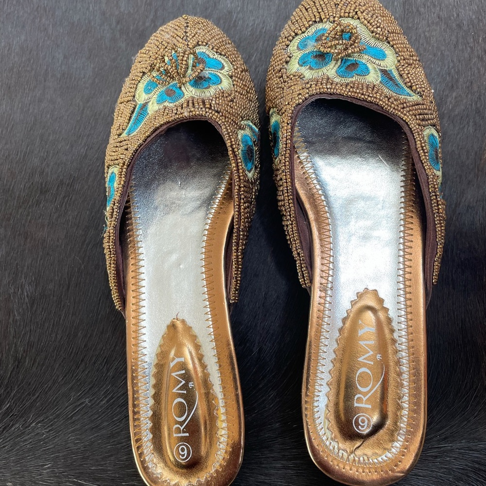 Beaded and embroidered mule / slipper with a low 1 1/2 inch heel.